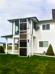 Outdoor white Genesis Enclosure in family residence in Sequim, WA, USA