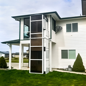 Outdoor white Genesis Enclosure at family residence