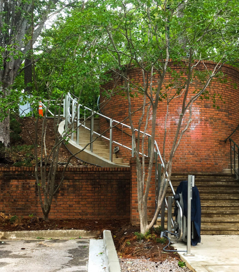 Outdoor Artira installed on stairs, brick building