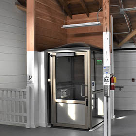 Genesis Enclosure installed at wooden building