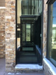 Elvoron Home Elevator in brick building