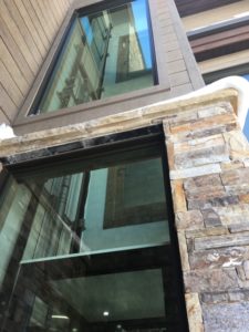 Elvoron Home Elevator in brick building